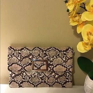 Faux snake leather clutch.NEW.